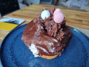 Chocolate cream doughnut at Teatime Collective in Manchester