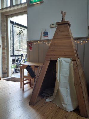 Kids area and door to outdoor seating at Old School Cafe in Bury St Edmunds