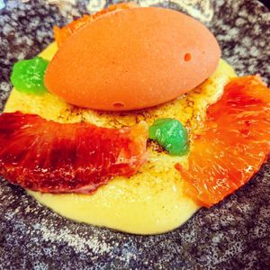 Dessert: Crema catalana with blood orange sorbet and fresh blood orange (vegan) at Cochon&Carot in Hemiksem