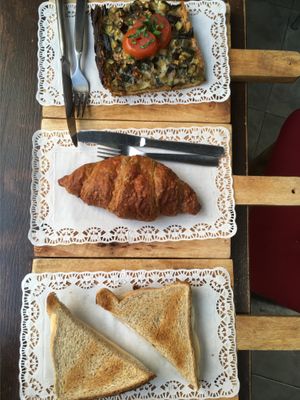 Panini with eggplant and zucchini, blueberry croissant and sandwiches with vegan cheese  at Biovegan Cafeteria Navarro in Valencia