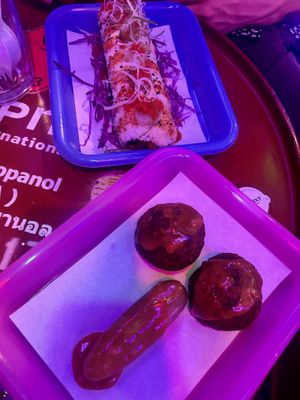 Phallically presented buff balls and the cheeseburger sushi  at BUFFALO TraP BAR in Bangkok