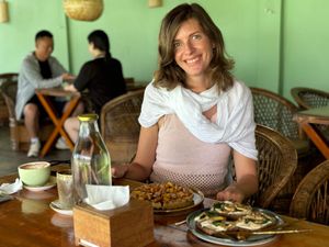 Enjoying some waffle and vegan cream cheese spinach mushroom toast at Lumuma in Pokhara