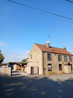 Front of the building, the kitchen is located through the gates on your right at Fudeboy Kitchen in Tytherington