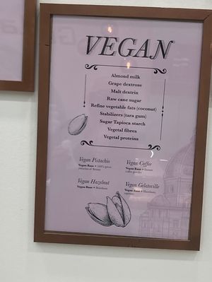Wall sign, one of two signs that show the vegan items  at Gelatoville - 9th Ave in New York City