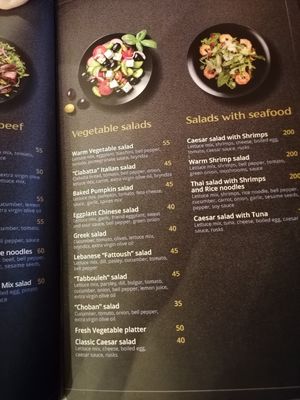Vegetable salad selection at Üzüm Café in Ashgabat