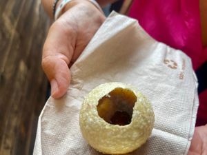 4️⃣55 Bombay Street - Pani Puri: Hollow fried dough balls filled with black chickpeas, potatoes, and spicy water  at Vegan Food Tour Rotterdam in Rotterdam