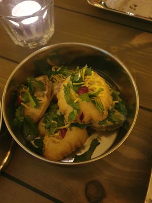 Vegan Yoghurt Chat Bombs: The heart of Mowgli. Crisp bread puffs filled with chickpeas, spiced yoghurt, tamarind & coriander. at Mowgli in Knutsford