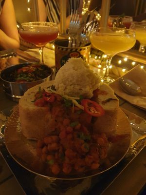 Holy Chow: Vegan showstopper. A good sharer. Spiced chickpea, potato, spinach, fresh ginger & mango served in a loaf. at Mowgli in Knutsford