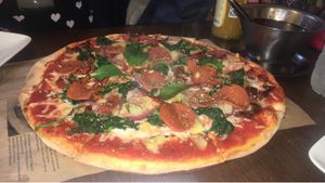 Pepperoni, spinach, sundries tomatoes and pineapple   at Express Pizza in Copenhagen