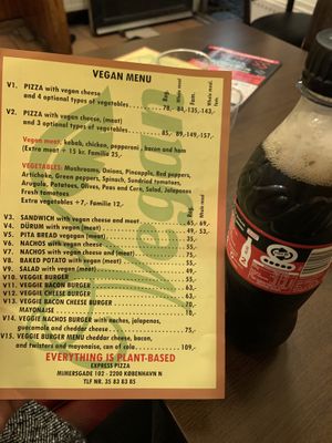Vegan menu out on the tables at Express Pizza in Copenhagen
