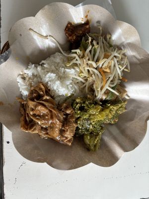 Rice with stir fried bean sprout, vegetarian chicken with green chili sauce, kembang tahu and sambal.  at Chang YUAN Vegetarian in Jakarta