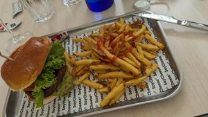 Burger and fries (little ketchup provided) at SayCheese! in Barcelona