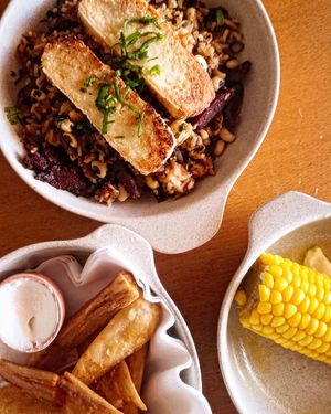 Baião de Dois com queijo coalho vegano, milho cozido e aipim at Church Lx in Lisbon