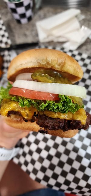 Burger with American cheese at Feed Me in Amarillo