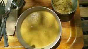 Sopa caliente de maiz, dhal de lentejas y leche de coco at Sopa - Boronat in Barcelona