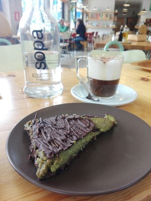 Great vegan and sugar free cake (matcha and banana with a chia base) and chicory cappuccino at Sopa - Boronat in Barcelona