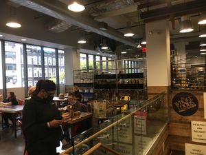 Upstair place with tables that you can sit and eat. at Whole Foods Market - E 57th in New York City