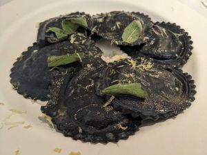Black ravioli with mushrooms at 26KG in Barcelona
