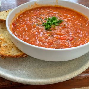 Roast capsicum, tomato and red lentil soup, served with grilled sourdough    at The Coterie in Korumburra