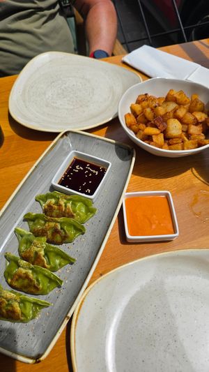 Gyozas and patatas bravas at L'Estret in Palafrugell