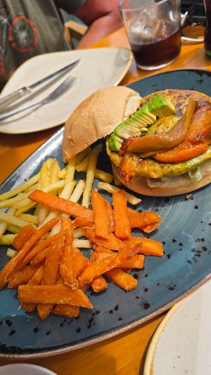 Vegan burger with fries at L'Estret in Palafrugell