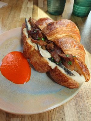 Croissant with house hot sauce at Bean's Café in East London