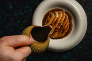 Confit Artichoke Stuffed Cabbage + Lions Mane Garum + Mushroom Jus at The Emerald Room in Darlinghurst