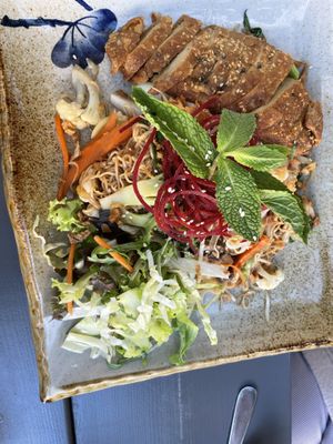 Seitan duck with fried noodles  at Bödhi in Leipzig