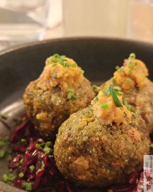 Gourmet cromesqui, made with brown rice, parsley, coriander, tofu, orange and ginger chutney and served with red cabbage marinated in Japanese miso. at Slow in Paris