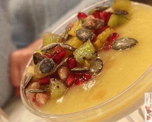 Coconut panacotta (vegan), with pear coulis, seasonal fruit, Thai basil at Slow in Paris