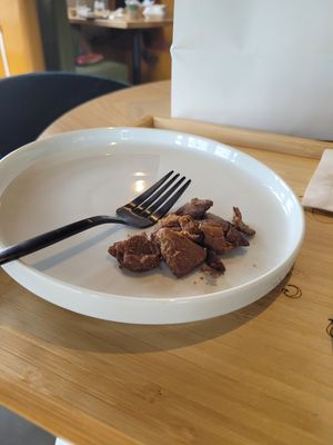 Sample of the gyro meat. Great flavor. at Just Falafel Vegan Cafe in Houston