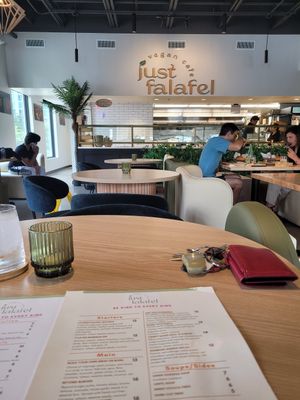 Cute, clean restaurant with great attention to detail in all aspects. at Just Falafel Vegan Cafe in Houston