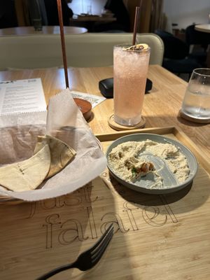 Paloma and Pita w/ Hummuss  at Just Falafel Vegan Cafe in Houston