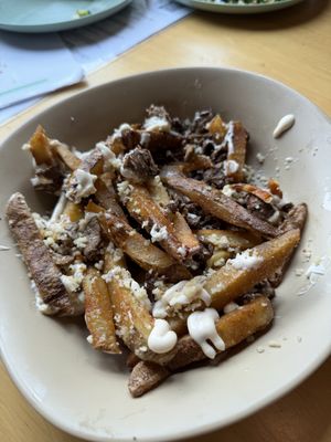 Loaded Gyro Truffle Fries  at Just Falafel Vegan Cafe in Houston