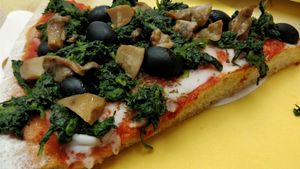 pizza with mushroom, black olives and spinach  at Natural Food in Lugano