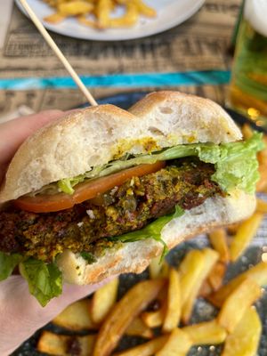 Vegan burger with falafel cutlet and fried potatoes.  at Maus Food & Drinks in Oviedo