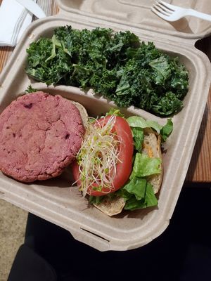 Beet burger with a side of garlicky kale at Cashew in Chattanooga