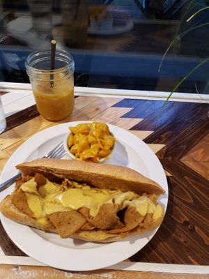 The philly sans peppers,onions and mushrooms.. Mac & cheese and Chai tumeric tea with almond milk.  at Cashew in Chattanooga