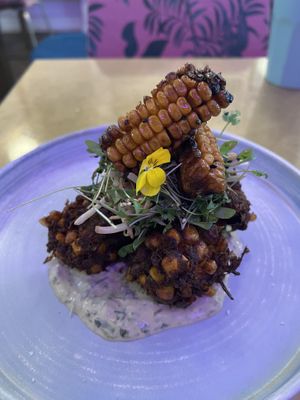 Sweet corn fritters on a bed of coconut and kaffir yoghurt, with corn ribs (lime and maple syrup coating)  at Kiss the Koala in North London