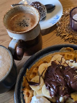 Tasty and very filling waffle, good coffee and nice variety of sweets at Queen Beans in Uppsala