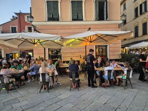 Outdoor seating on the little square at La Sciamadda Dei Vinaccieri Ballerini in Sestri Levante