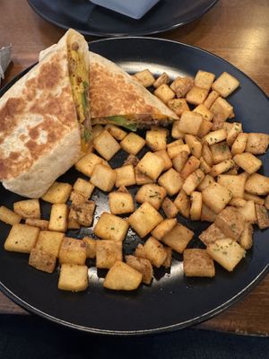 This breakfast burrito was super YUM!   at MoonShine in Cocoa