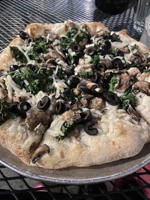 Umami pizza made vegan sub onions for olives no balsamic   at Lucille in Madison