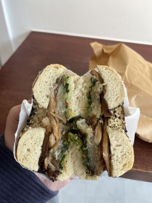 Vegan breakfast bagel on an everything bagel. Oyster mushrooms, hashbrowns and chimichurri.   at Little Bagel Co in Bristol