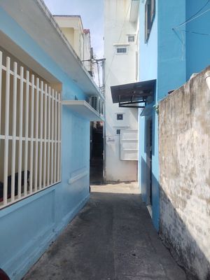 Location - Seeds sign at the end of the alley. at The Seeds Plant-Based Foods & Desserts in Hoi An