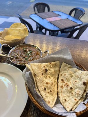 Garlic naan and aloo matar curry   at Mother India in Kota Kinabalu