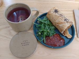 Lavender blueberry tea and the vegan sausage roll at Kilnfolk Coffee in Sheffield