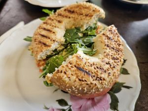 Bagel with hummus, tomato and rocket at Café Hüftgold in Dusseldorf