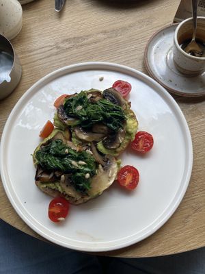 Vegan brunch (Bread, Avocados, Mushrooms, Spinach, Tomatoes, Sunflower Seeds)  at Ottos Restocafé in Tirana