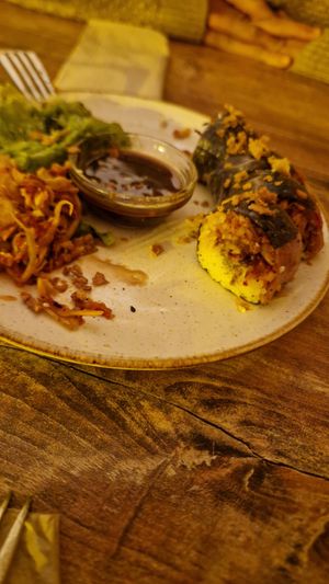 Suhi with Kimchi and a salad. Already halfway done 😅 at Monkey Mood in Capbreton